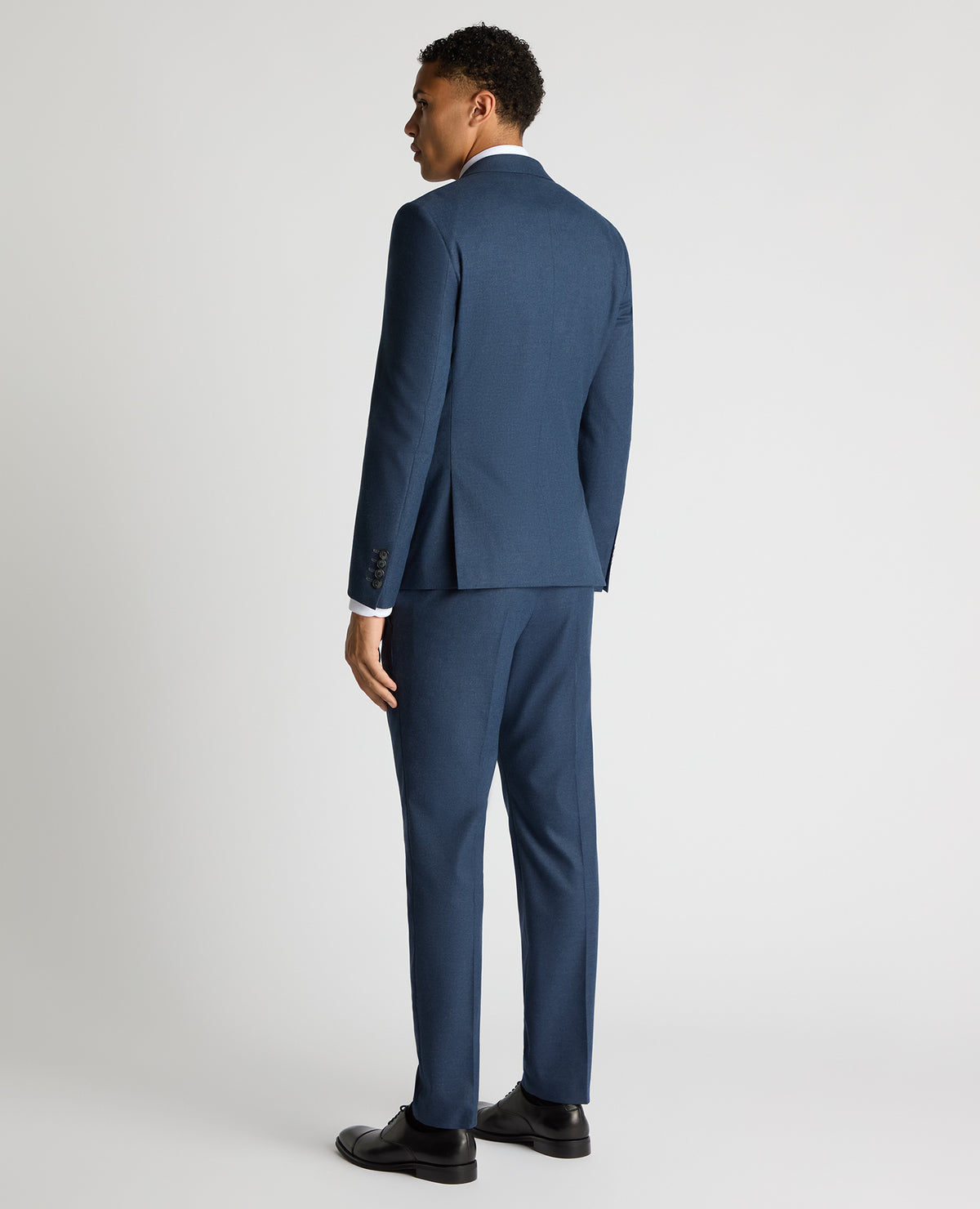 Man wearing a blue Slim Fit Stretch Suit