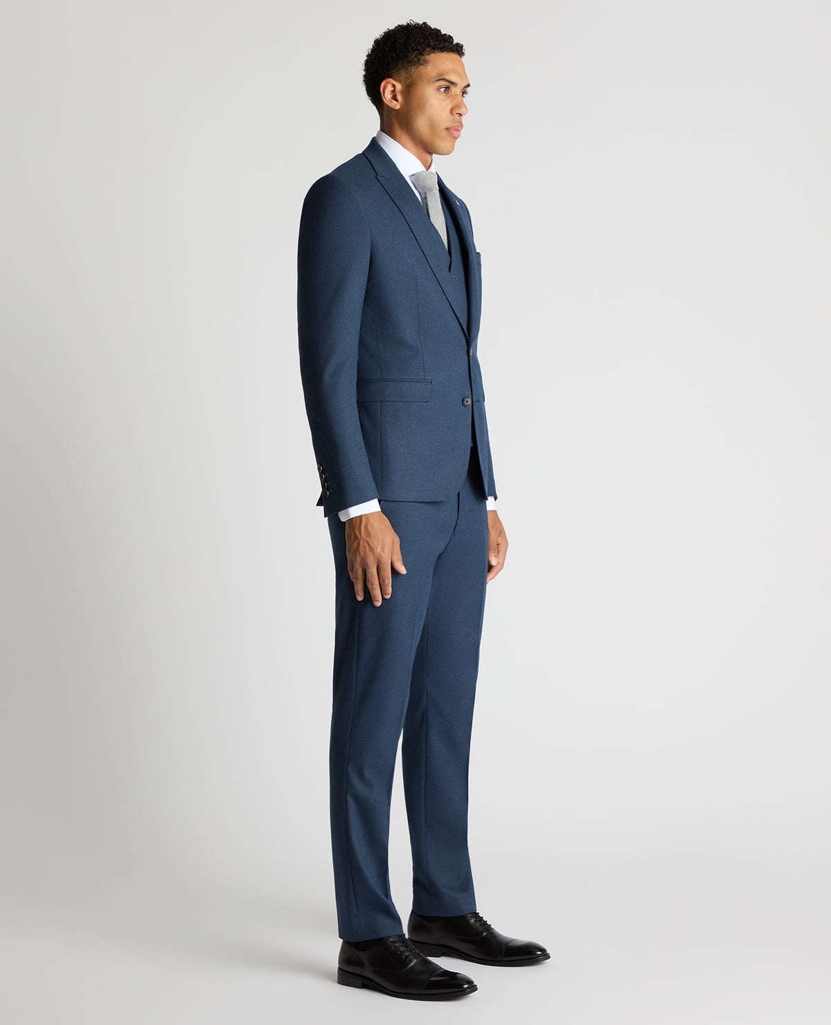 Man wearing a blue Slim Fit Stretch Suit