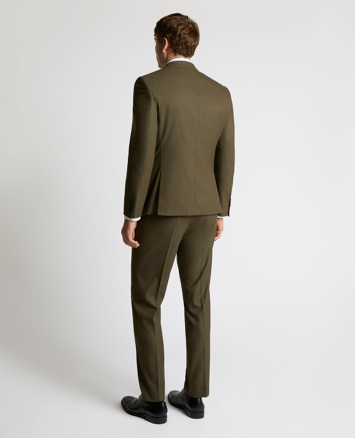 Man wearing a green Slim Fit Monza Jacket