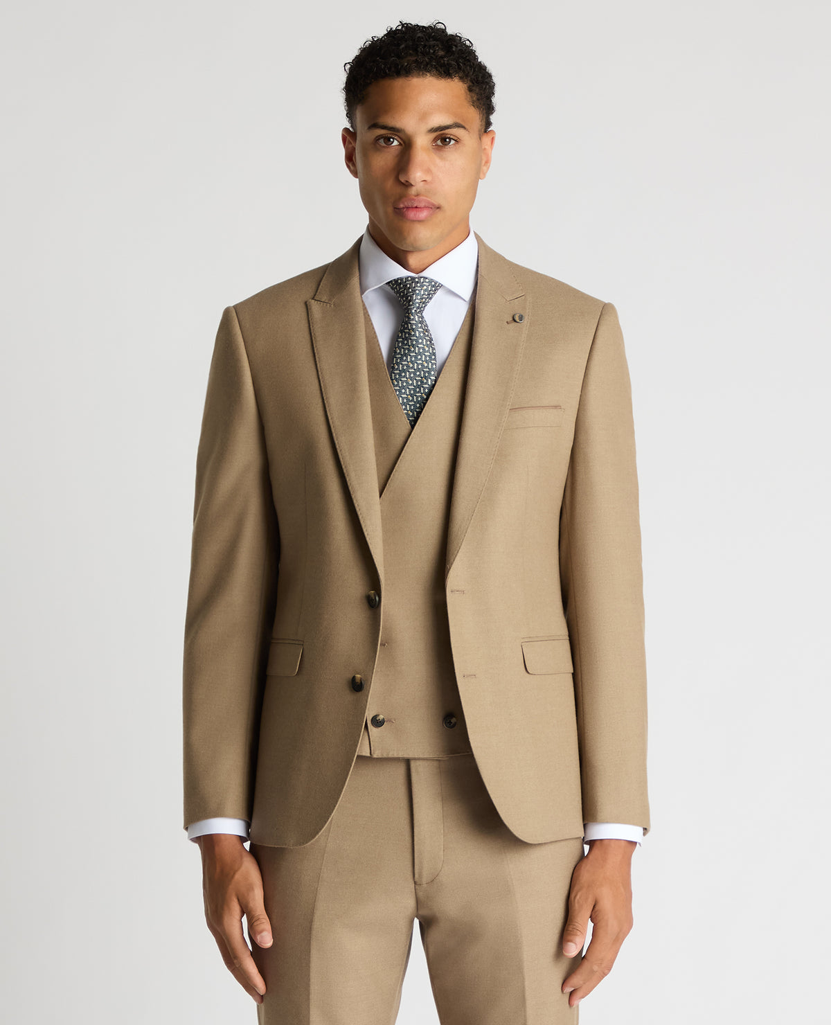 Man wearing a sand Slim Fit Stretch Suit Jacket