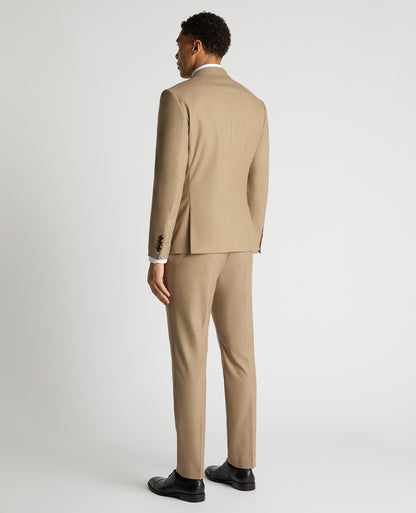 Man wearing a sand Slim Fit Stretch Suit Jacket