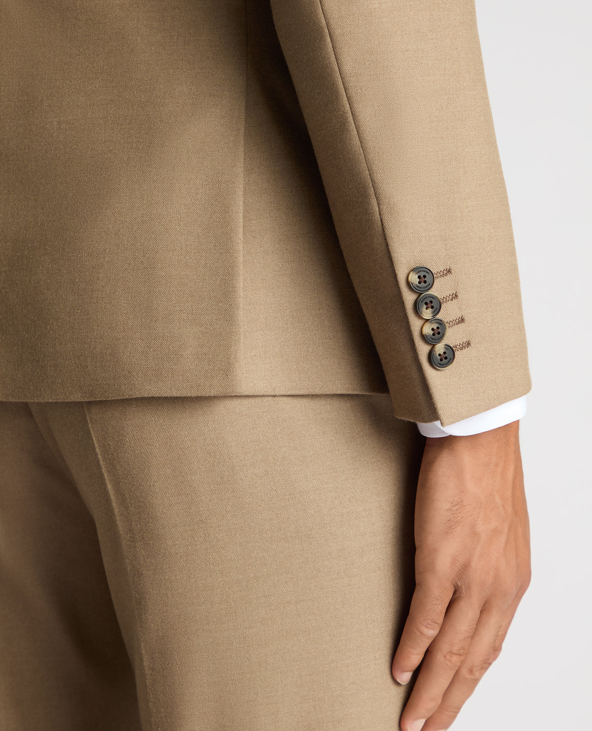 Man wearing a sand Slim Fit Stretch Suit Jacket