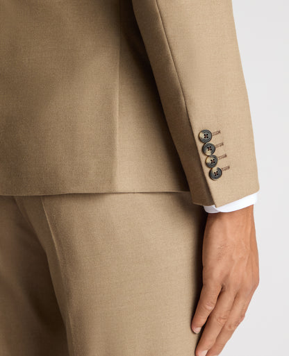 Man wearing a sand Slim Fit Stretch Suit Jacket
