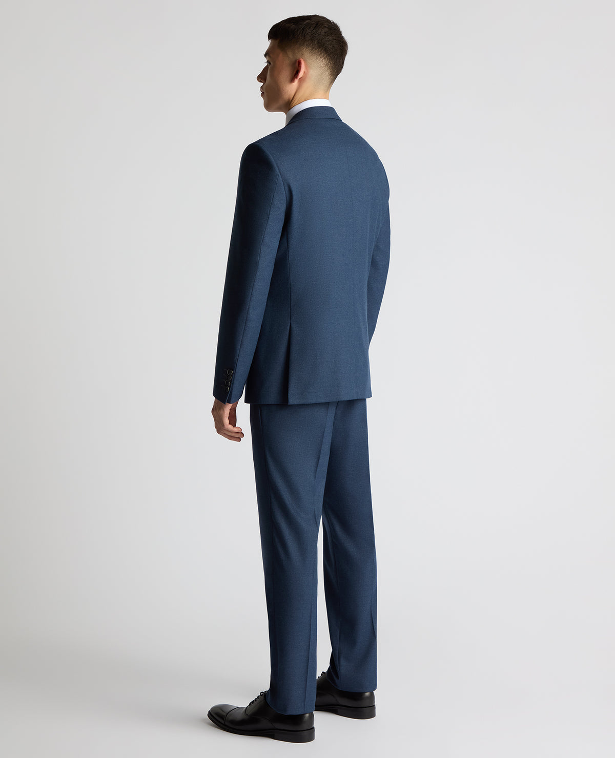 Man wearing a blue Tapered Fit Stretch Suit