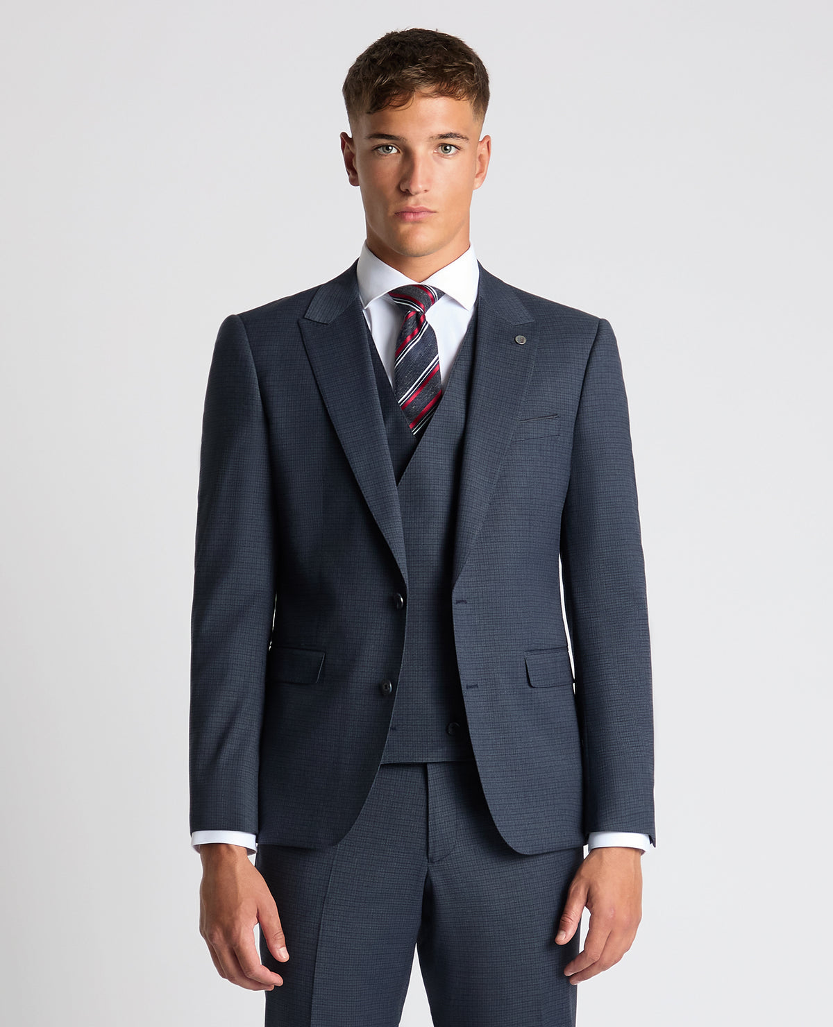 Man wearing a blue Slim Fit Checked Stretch Suit Jacket