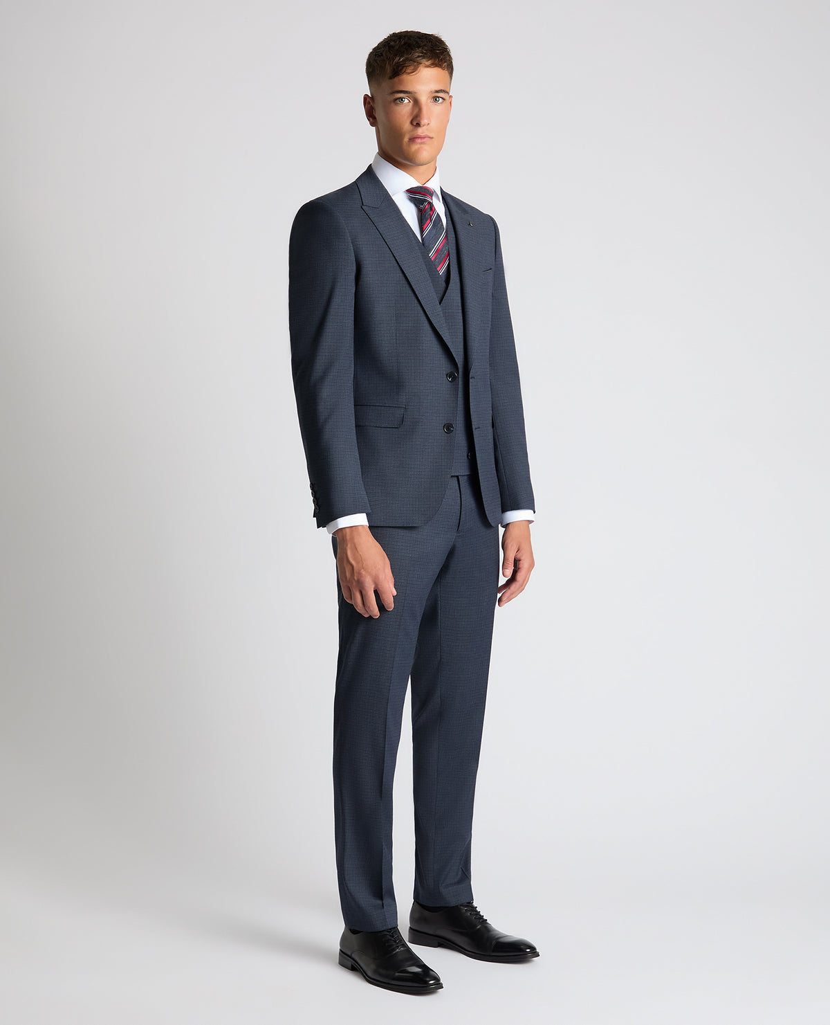 Man wearing a blue Slim Fit Checked Stretch Suit