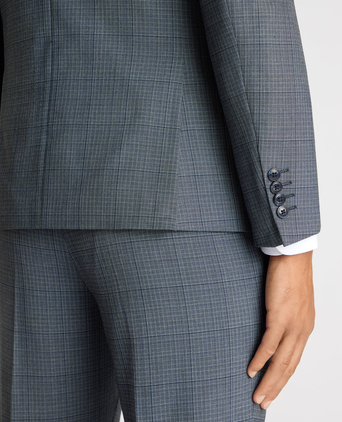 Man wearing a blue Slim Fit Checked Stretch Suit Jacket