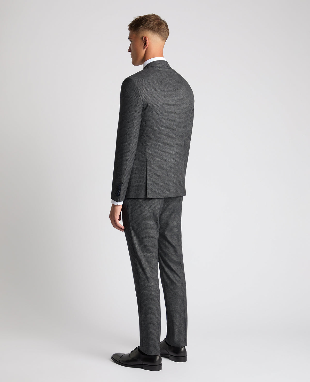 Man wearing a grey Slim Fit Stretch Suit
