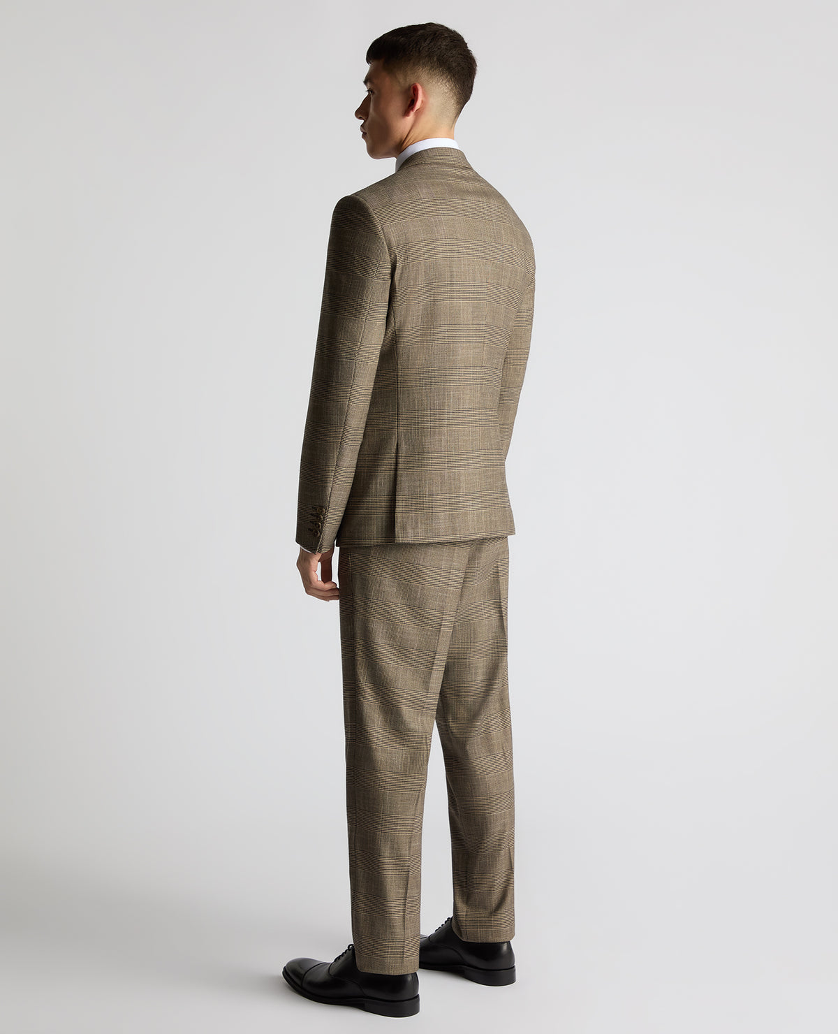 Man wearing a sand Slim Fit Double Breasted Suit Jacket