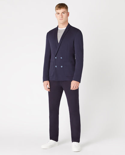 Man wearing a navy Slim Fit Double Breasted Stretch Jersey Jacket