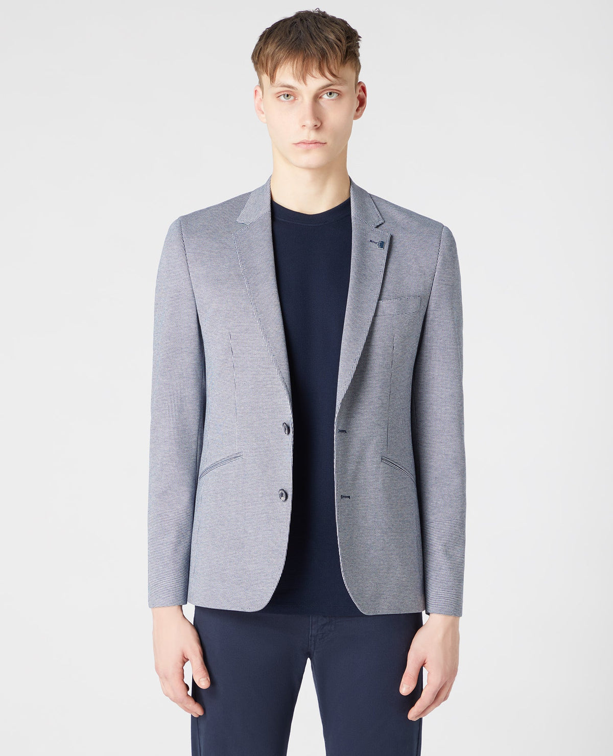 Man wearing a blue Tapered-Fit Stretch Jacket