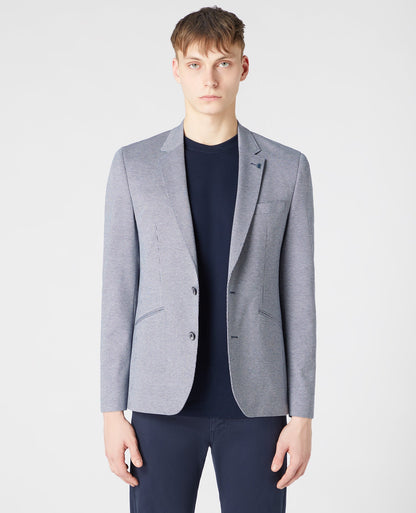 Man wearing a blue Tapered-Fit Stretch Jacket