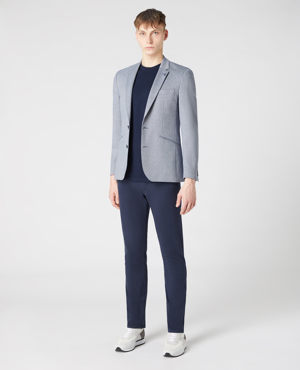 Man wearing a blue Tapered-Fit Stretch Jacket
