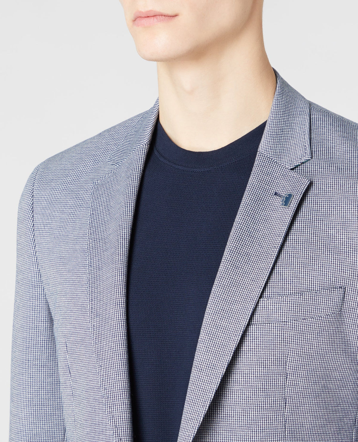 Man wearing a blue Tapered-Fit Stretch Jacket