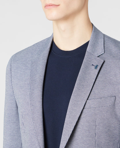 Man wearing a blue Tapered-Fit Stretch Jacket