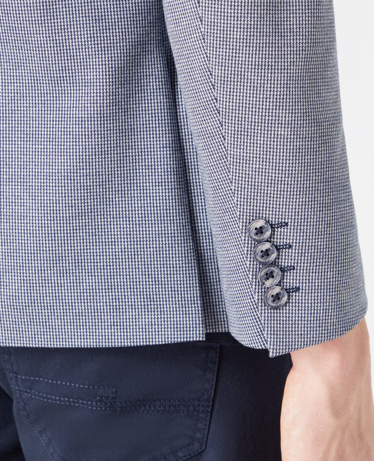 Man wearing a blue Tapered-Fit Stretch Jacket