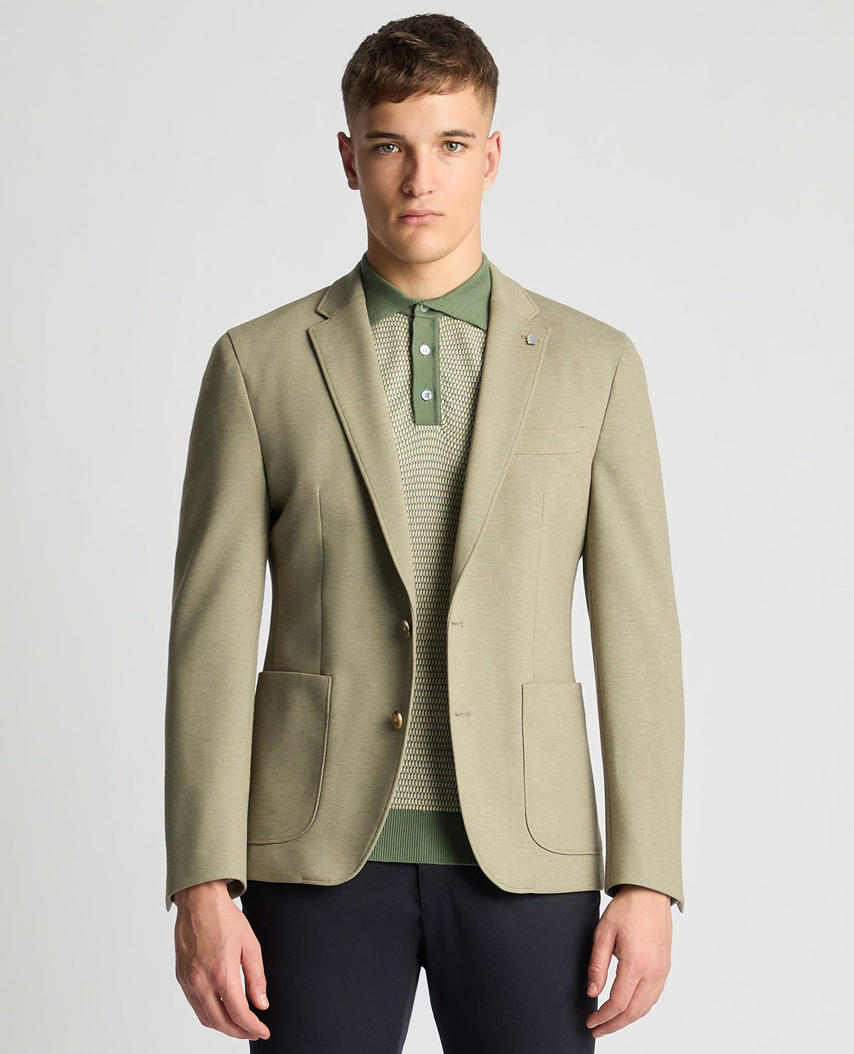 Man wearing a green Slim Fit Jersey Stretch Jacket
