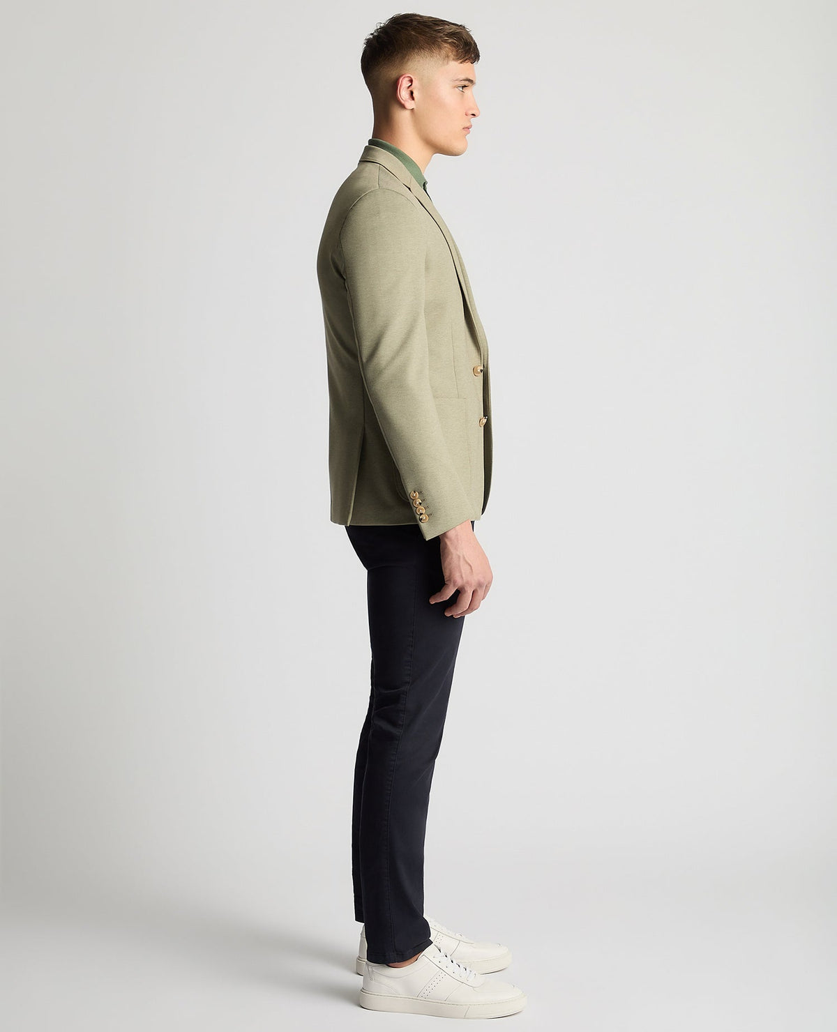 Man wearing a green Slim Fit Jersey Stretch Jacket