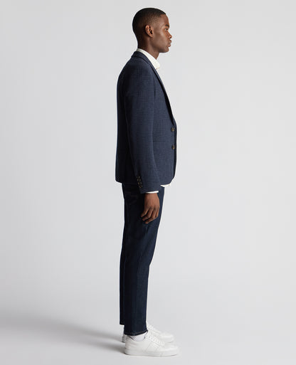 Man wearing a navy Slim Fit Checked Wool Jacket