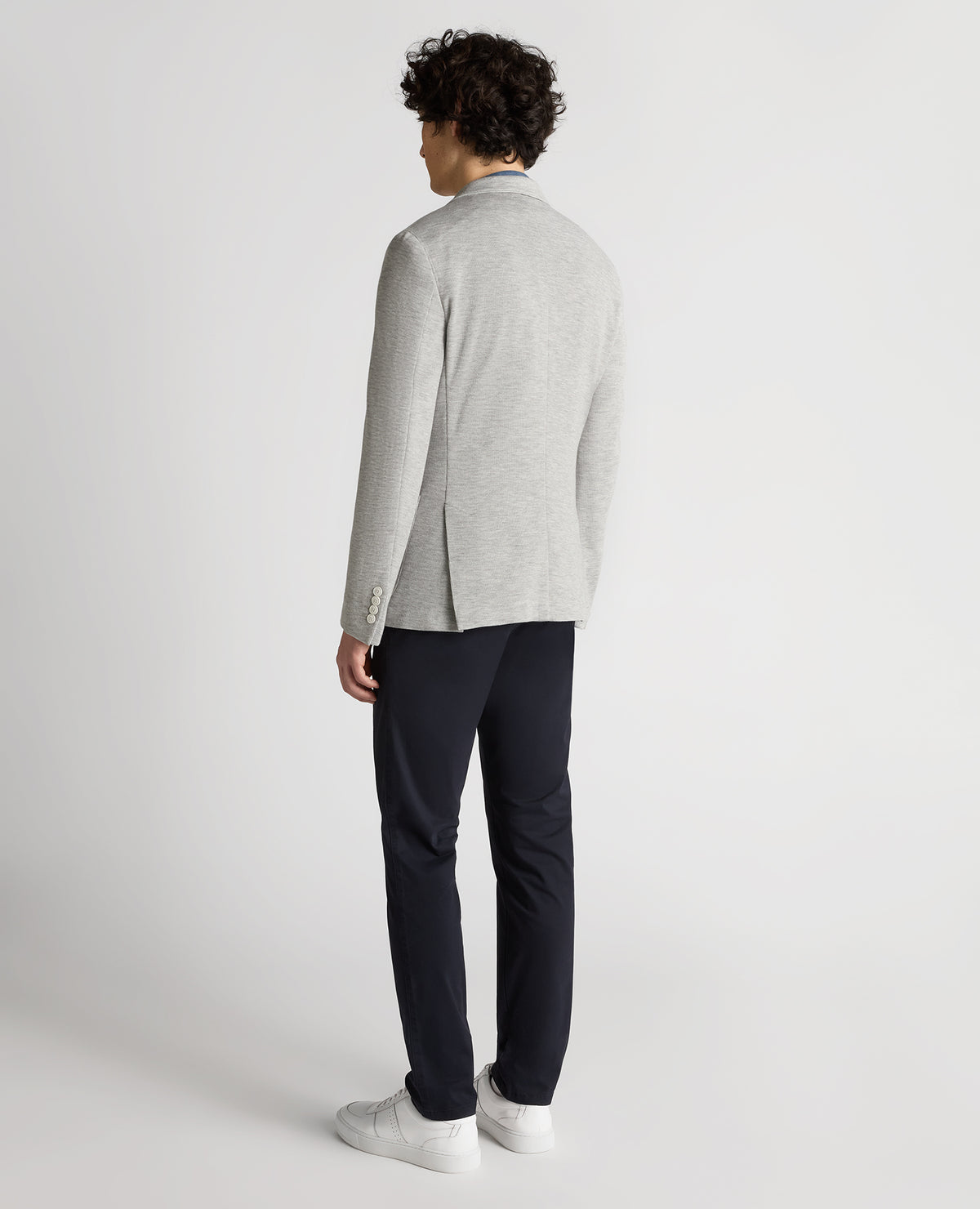 Man wearing a grey Slim Fit Jersey Stretch Jacket