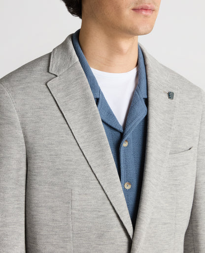 Man wearing a grey Slim Fit Jersey Stretch Jacket