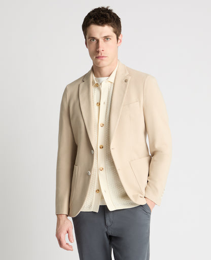 Man wearing a cream jacket