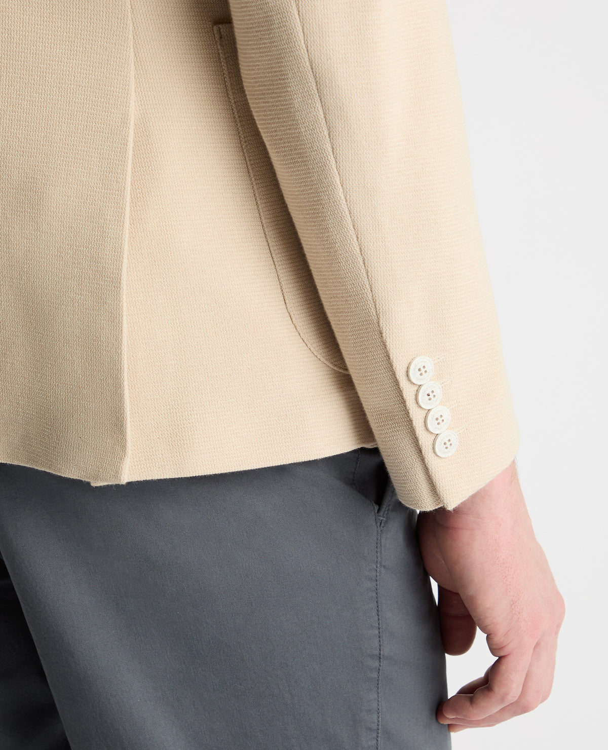 Man wearing a cream jacket