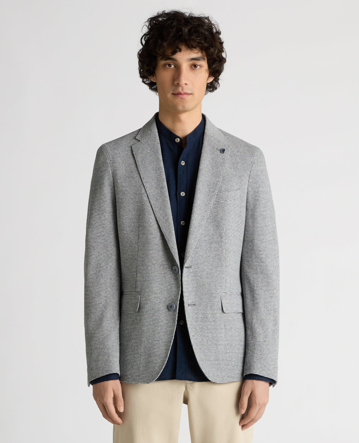 Man wearing a blue Slim Fit Cotton-Blend Stretch Jacket