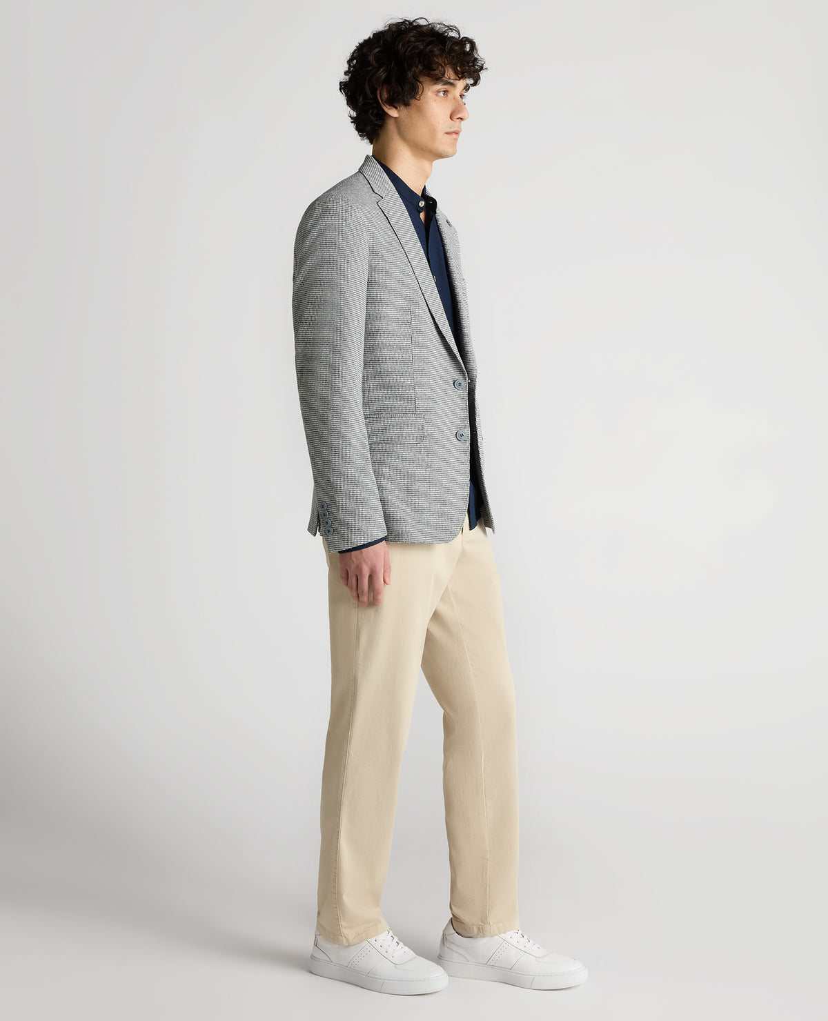 Man wearing a blue Slim Fit Cotton-Blend Stretch Jacket
