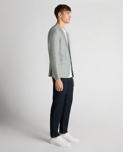Man wearing a navy Slim Fit Linen-Blend Pinstripe Jacket