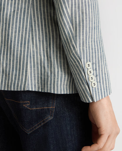 Man wearing a navy Slim Fit Linen-Blend Pinstripe Jacket