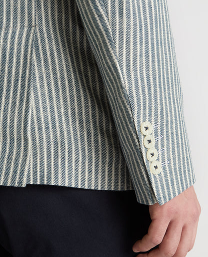 Man wearing a navy Slim Fit Linen-Blend Double-Breasted Pinstripe Jacket