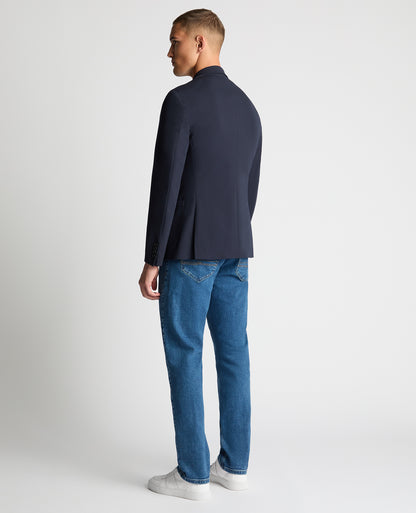 Man wearing a navy Slim Fit Stretch Jacket