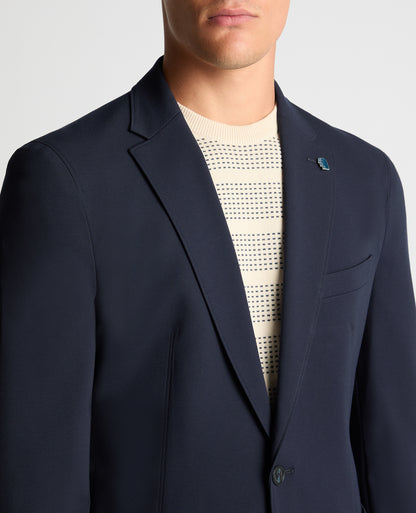 Man wearing a navy Slim Fit Stretch Jacket
