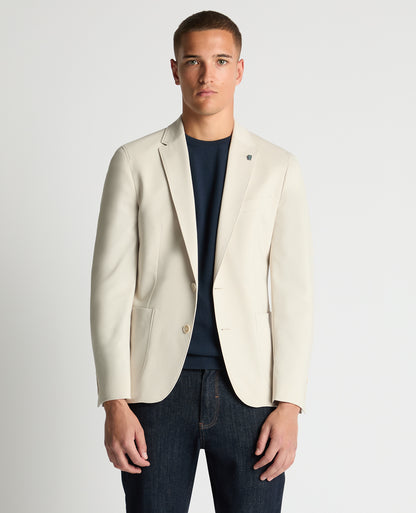 Man wearing a sand Slim Fit Stretch Jacket