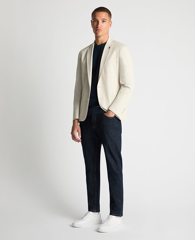 Man wearing a sand Slim Fit Stretch Jacket