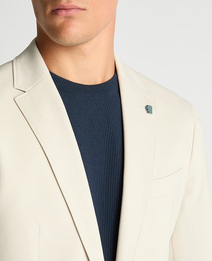 Man wearing a sand Slim Fit Stretch Jacket