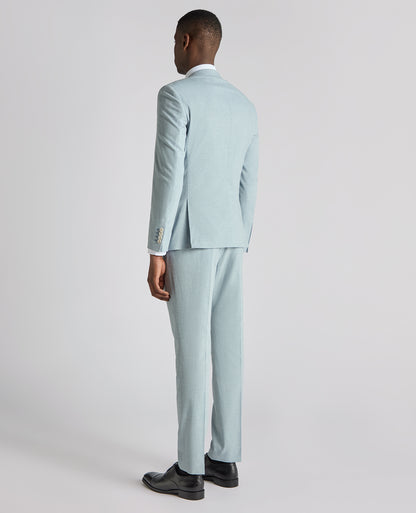 Man wearing a blue Slim Fit Linen-Blend Micro Pinstripe Suit Jacket