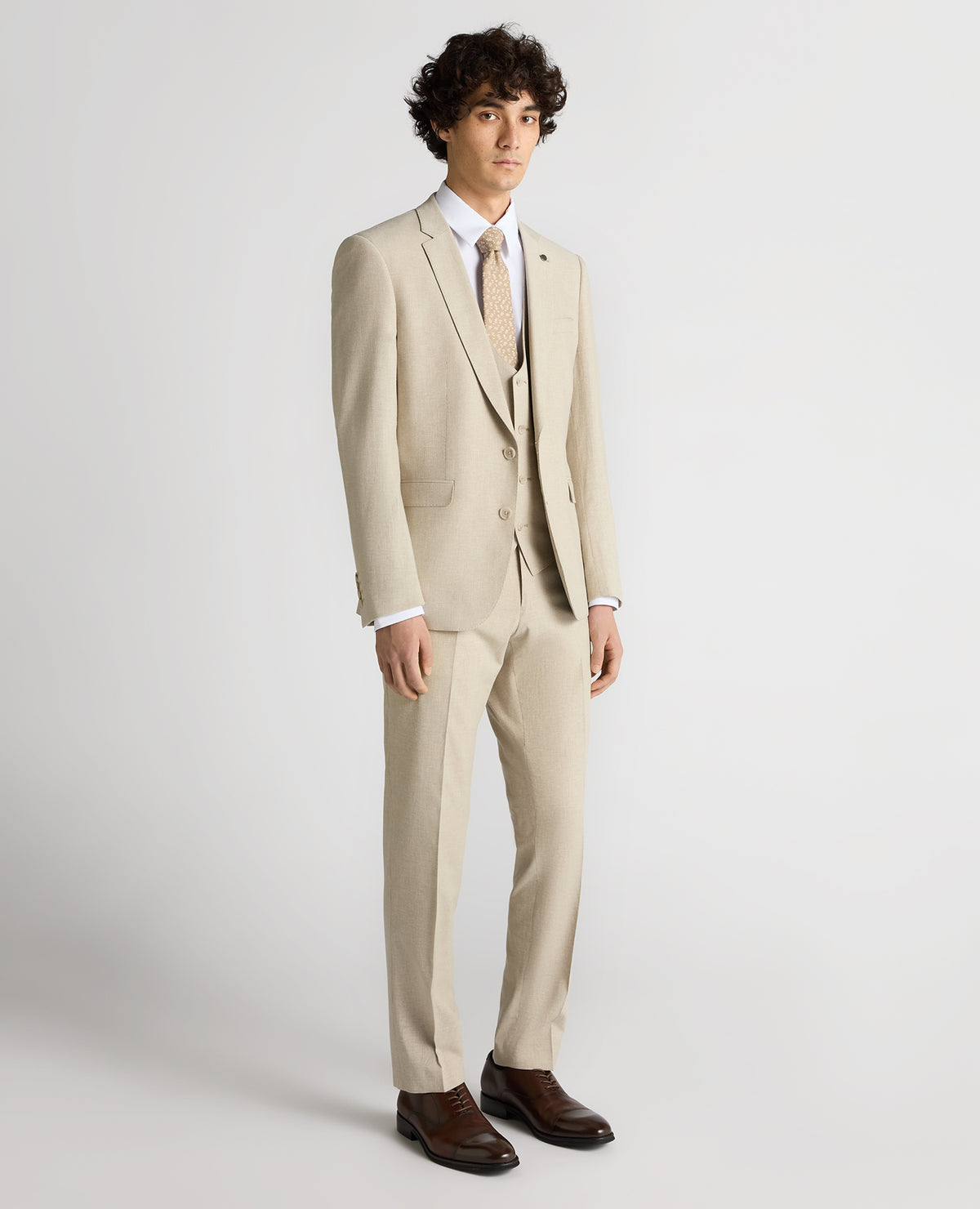 Man wearing a sand Slim Fit Linen-Blend Micro Pinstripe Suit Jacket