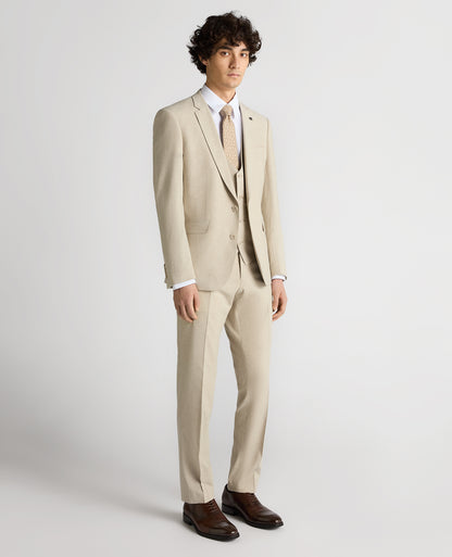 Man wearing a sand Slim Fit Linen-Blend Micro Pinstripe Suit Jacket