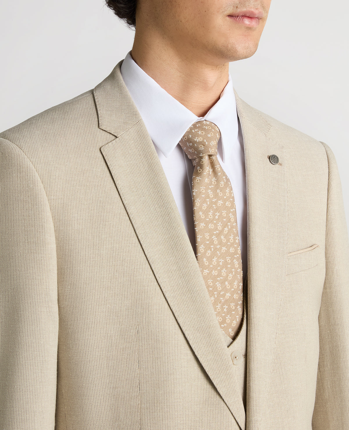 Man wearing a sand Slim Fit Linen-Blend Micro Pinstripe Suit Jacket