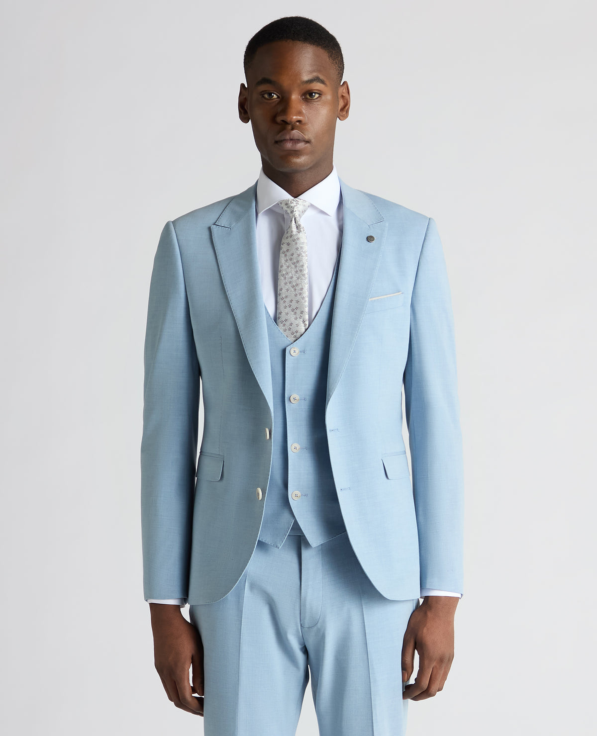 Man wearing a blue Slim Fit Stretch Suit Jacket