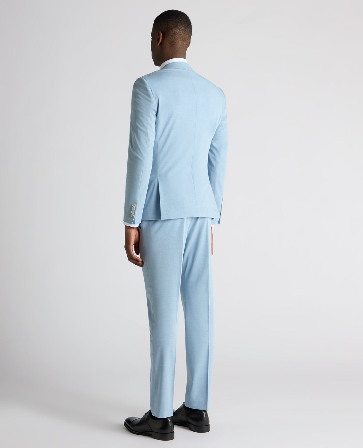 Man wearing a blue Slim Fit Stretch Suit