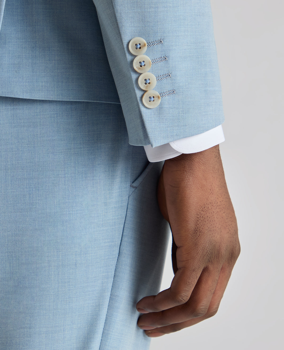 Man wearing a blue Slim Fit Stretch Suit Jacket