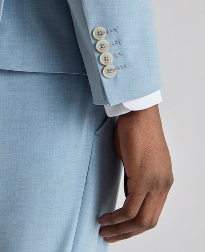 Man wearing a blue Slim Fit Stretch Suit Jacket