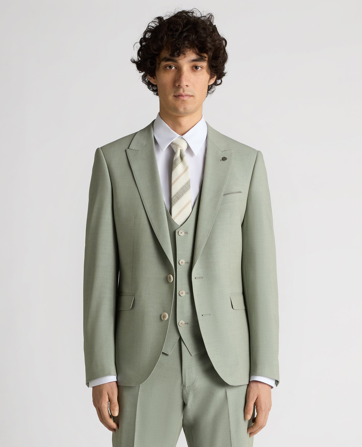 Man wearing a green Slim Fit Stretch Suit Jacket