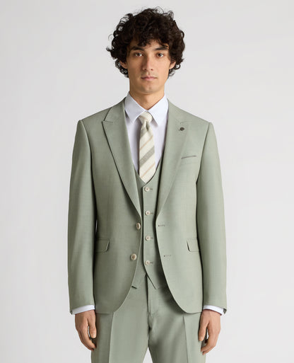 Man wearing a green Slim Fit Stretch Suit Jacket