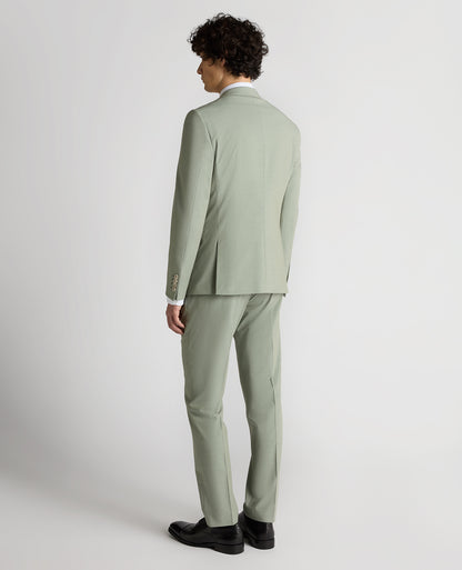 Man wearing a green Slim Fit Stretch Suit Jacket