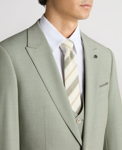 Man wearing a green Slim Fit Stretch Suit