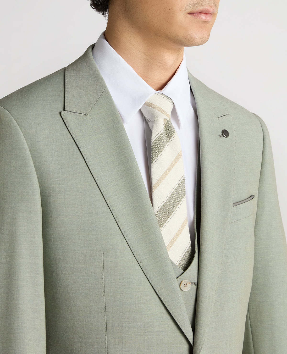 Man wearing a green Slim Fit Stretch Suit Jacket